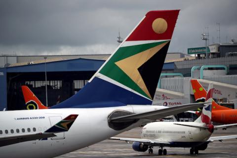 The logo of South African Airways (SAA) is seen on an aircraft at O.R. Tambo International Airport in Johannesburg, South Africa, February 14, 2019. PHOTO BY REUTERS/Mike Hutchings