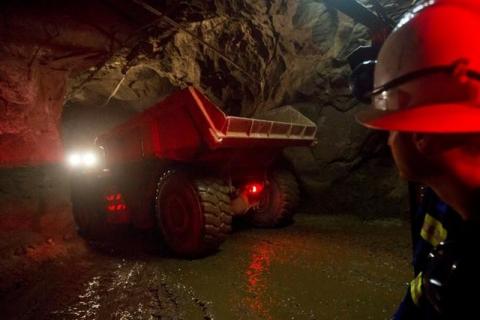 A truck travels to a depth of 516 metres below the surface to collect ore at the Chibuluma copper mine in the Zambian copperbelt region, January 17, 2015. PHOTO BY REUTERS/Rogan Ward
