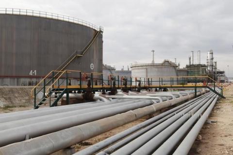A view shows pipelines and crude oil storage tanks at an oil refinery in Zawia, 55km west of Tripoli. PHOTO BY REUTERS/Ismail Zitouny
