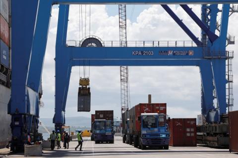 A crane loads shipping containers on a ship in the port of Mombasa, Kenya, October 23, 2019. PHOTO BY REUTERS/Baz Ratner