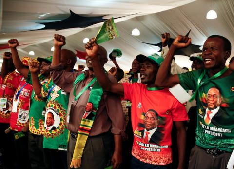 Zimbabwe's President Emmerson Mnangagwa's supporters arrive for the ruling ZANU PF party's annual conference on the outskirts of Harare, Zimbabwe, December 13, 2019. PHOTO BY REUTERS/Philimon Bulawayo