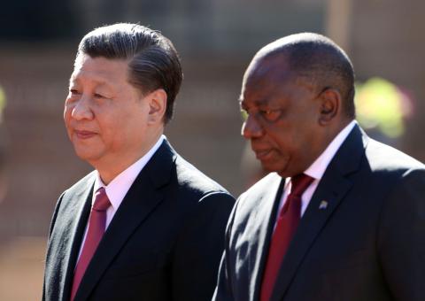 China's President Xi Jinping walks with South African President Cyril Ramaphosa before their meeting in Pretoria, South Africa, July 24, 2018. PHOTO BY REUTERS/Mike Hutchings