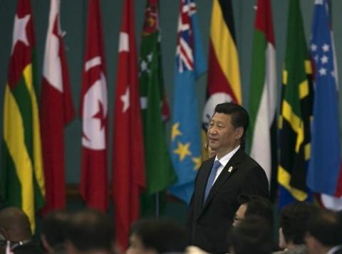 Chinese President Xi Jinping arrives to attend the closing statement for the Asian-African Conference in Jakarta April 23, 2015. REUTERS/Darren Whiteside