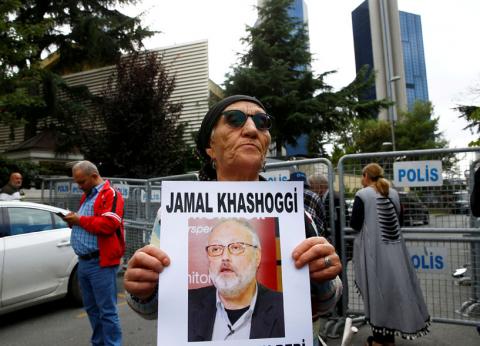 A human rights activist holds picture of Saudi journalist Jamal Khashoggi during a protest outside the Saudi Consulate in Istanbul, Turkey, October 9, 2018. PHOTO BY REUTERS/Osman Orsal