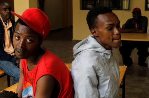 Recovering drug addicts Peter (L) and Jason wait to take methadone at a Medication Assisted Therapy clinic run by Doctors Without Borders (MSF) at Karuri Level 4 hospital in Kiambu, Kenya, October 3, 2019. PHOTO BY REUTERS/Njeri Mwangi