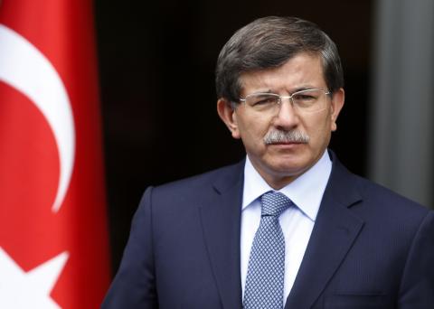 Turkey's Foreign Minister Ahmet Davutoglu addresses the media in Ankara
