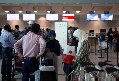 People line up to check in for a flight from Toronto Pearson International Airport to Riyadh, Saudi Arabia, in Toronto, Canada, August 10, 2018. PHOTO BY REUTERS/Chris Donovan