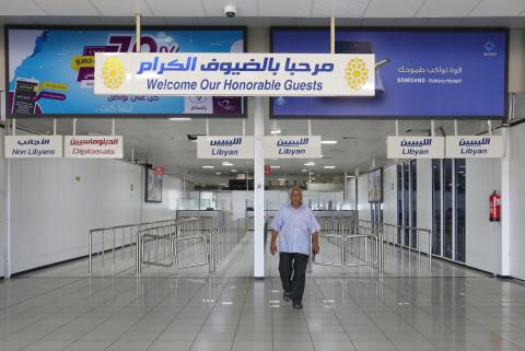 A man walks inside the empty Mitiga airport, in Tripoli, Libya, September 4, 2018. REUTERS/Hani Amara