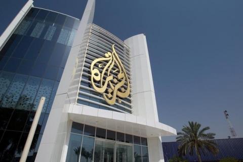 The Al Jazeera Media Network logo is seen on its headquarters building in Doha, Qatar, June 8, 2017. PHOTO BY EUTERS/Naseem Zeitoon