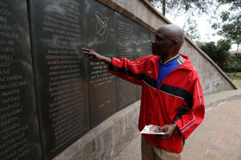 Ali Mwadama, a survivor of the 1998 U.S. Embassy bombing, looks for the names of his friends on the August 7th memorial wall in Nairobi, Kenya, August 5, 2018. PHOTO BY REUTERS/Baz Ratner
