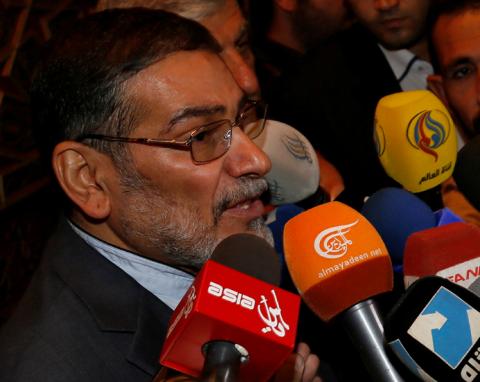 Admiral Ali Shamkhani, Iran's Supreme National Security Council Director, speaks to the media after his arrival at Damascus airport, September 30, 2014. PHOTO BY REUTERS/Khaled al-Hariri
