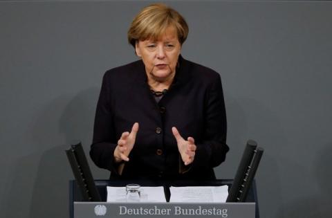 German Chancellor Angela Merkel addresses a session of the German lower house of parliament, the Bundestag, in Berlin, Germany, November 25, 2015. PHOTO BY REUTERS/Fabrizio Bensch
