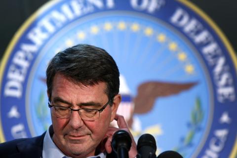 U.S. Defense Secretary Ash Carter pauses while speaking to reporters at a news conference after a regional security meeting at Camp Arifjan, February 23, 2015. PHOTO BY REUTERS/Jonathan Ernst