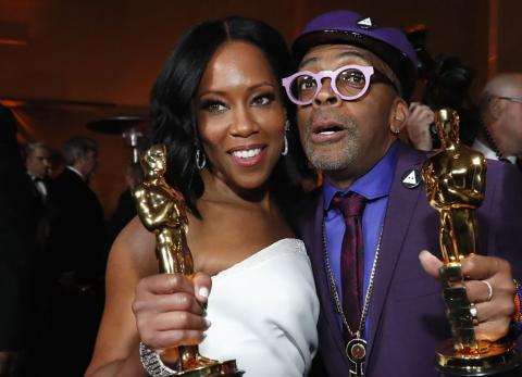 Regina King with her Best Supporting Actress award for "If Beale Street Could Talk" and Spike Lee holding his Best Adapted Screenplay award for "BlacKkKlansman" at the 91st Academy Awards, Oscars Governors Ball, Hollywood, Los Angeles, California, U.S., February 24, 2019.  PHOTO BY REUTERS/Mario Anzuoni