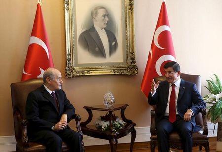 Turkey's Prime Minister Ahmet Davutoglu (R) meets opposition Nationalist Movement Party (MHP) Leader Devlet Bahceli as part of the first round of coalition talks in Ankara, Turkey, July 14, 2015. PHOTO BY REUTERS/Adem Altan
