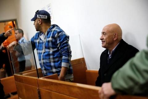 Israeli Knesset member Basel Ghattas sits at the Magistrates Court as police suspect Ghattas of smuggling mobile telephones into an Israeli jail for Palestinian convicts imprisoned for security offences against the state, in Rishon Lezion, Israel, December 23, 2016. PHOTO BY REUTERS/Amir Cohen