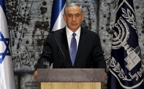 Israeli Prime Minister Benjamin Netanyahu speaks during a ceremony at President Reuven Rivlin's residence in Jerusalem, March 25, 2015. PHOTO BY REUTERS/Ammar Awad
