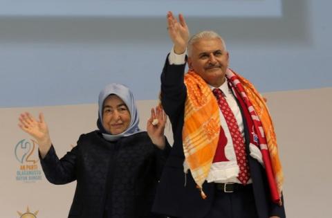 Turkey's Transportation Minister Binali Yildirim, accompanied by his wife Semiha Yildirim, greets members of his party during the Extraordinary Congress of the ruling AK Party (AKP) to choose the new leader of the party, in Ankara, Turkey, May 22, 2016. PHOTO BY REUTERS/Riza Ozel