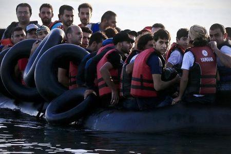 Syrian refugees arrive on a dinghy at the Greek island of Kos after crossing a part of the Aegean sea from Turkey to Greece, August 15, 2015. PHOTO BY REUTERS/Alkis Konstantinidis