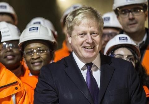 London mayor Boris Johnson smiles as he attends Britain's Queen Elizabeth formal unveiling of the new logo for Crossrail, which is to be named the Elizabeth line, at the construction site of the Bond Street station in central London, February 23, 2016. PHOTO BY REUTERS/Richard Pohle