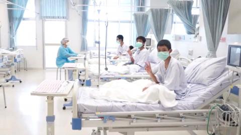 A screen grab shows boys rescued from the Thai cave wearing mask and resting in a hospital in Chiang Rai, Thailand from a July 11, 2018 handout video. PHOTO BY REUTERS/Government Public Relations Department (PRD) and Government Spokesman Bureau
