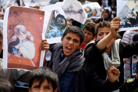 Boys demonstrate outside the offices of the United Nations in Sanaa, Yemen to denounce last weeks air strike that killed dozens including children in the northwestern province of Saada, August 13, 2018. PHOTO BY REUTERS/Khaled Abdulla