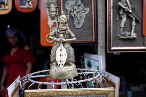 A bronze work is displayed for sale in front of a shop in Benin City, Edo state, Nigeria, June 13, 2018. PHOTO BY REUTERS/Akintunde Akinleye