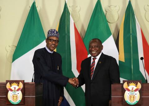 Nigeria's President Muhammadu Buhari shakes hands with his South African counterpart Cyril Ramaphosa during a news conference after a meeting, in Pretoria, South Africa, October 3, 2019. PHOTO BY REUTERS/Siphiwe Sibeko