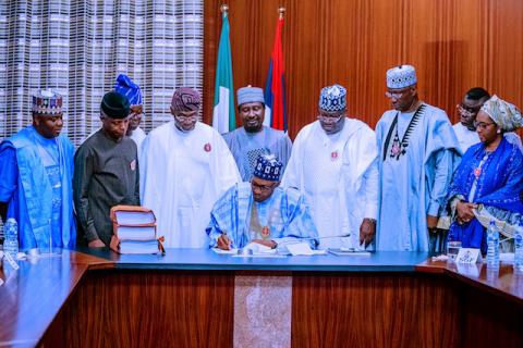 Nigeria's President Muhammadu Buhari approves 2020 budget in Abuja, Nigeria, December 17, 2019. PHOTO BY REUTERS/Nigeria Presidency
