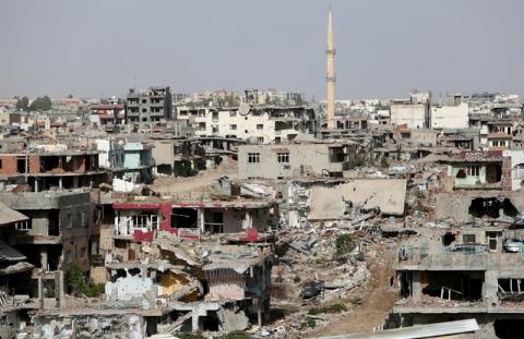 Buildings which were damaged during the security operations and clashes between Turkish security forces and Kurdish militants, are pictured in Nusaybin, a district of Turkey's southeastern province of Mardin on the Syrian border, Turkey, July 25, 2016. PHOTO BY REUTERS/Sertac Kayar