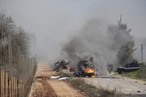 Burning vehicles are seen near the village of Ghajar on Israel's border with Lebanon, January 28, 2015. A Hezbollah missile strike wounded four Israeli soldiers on Wednesday, the biggest attack on Israeli forces by the Lebanese guerrilla group since a 34-day war in 2006. PHOTO BY REUTERS/Maruf Khatib