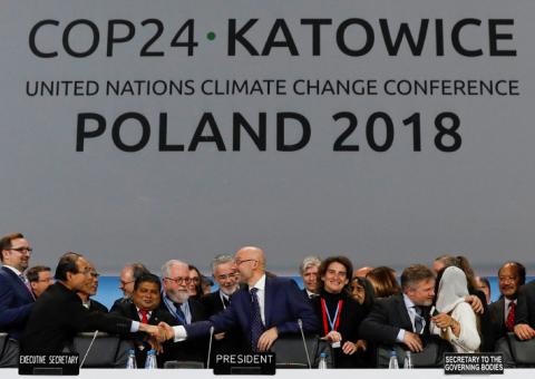 COP24 President Michal Kurtyka is greeted after adopting the final agreement during a closing session of the COP24 U.N. Climate Change Conference 2018 in Katowice, Poland, December 15, 2018. PHOTO BY REUTERS/Kacper Pempel
