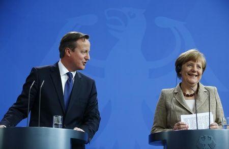 German Chancellor Angela Merkel and Britian's Prime Minister David Cameron address a joint news conference following a meeting at the Chancllery in Berlin, Germany, May 29, 2015. PHOTO BY REUTERS/Hannibal Hanschke