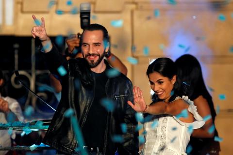 Presidential candidate Nayib Bukele of the Great National Alliance (GANA) and his wife Gabriela de Bukele gesture as they celebrate with supporters after the first official presidential election results were released in San Salvador, El Salvador, February 3, 2019. PHOTO BY REUTERS/Jose Cabezas