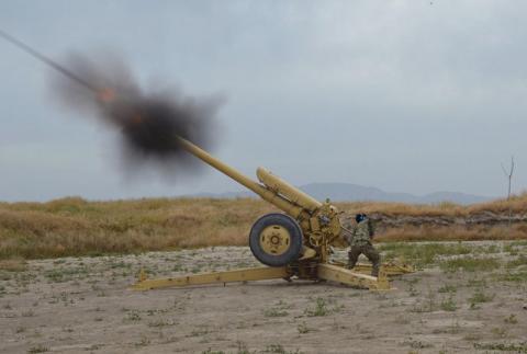 Afghan National Army soldiers fire artillery during a battle with Taliban insurgents in Kunduz, Afghanistan, April 29, 2015. PHOTO BY REUTERS/Stringer