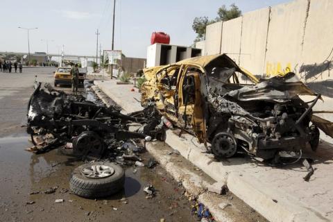 The remains of the car that exploded in the Saydiya district of southern Baghdad, Iraq, May 2, 2016. PHOTO BY REUTERS/Khalid al Mousily