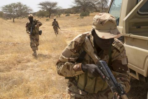 Chadian soldiers run during a mock ambush during Flintlock 2014, a U.S.-led international training mission for African militaries, in Diffa