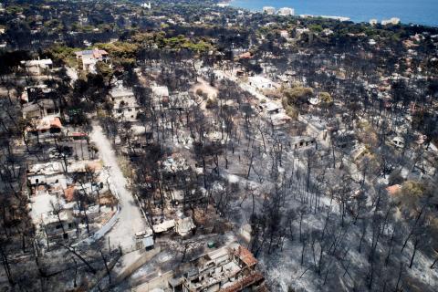 An aerial view shows burnt houses and trees following a wildfire in the village of Mati, near Athens, Greece, July 25, 2018. PHOTO BY REUTERS/Antonis Nicolopoulos/Eurokinissi