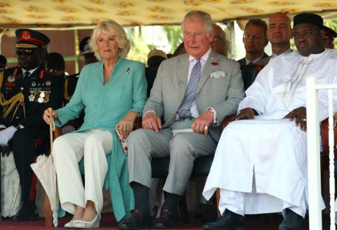 Gambia's President Adama Barrow sits with Britain's Prince Charles and Camilla, Duchess of Cornwall, at McCarthy Square during an official welcome ceremony in Banjul, Gambia, November 1, 2018. PHOTO BY REUTERS/Luc Gnago