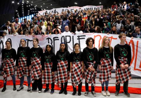 Children attend a Global Campaign to Demand Climate Justice demonstration before the final session of the COP24 U.N. Climate Change Conference 2018 in Katowice, Poland, December 14, 2018. PHOTO BY REUTERS/Kacper Pempel