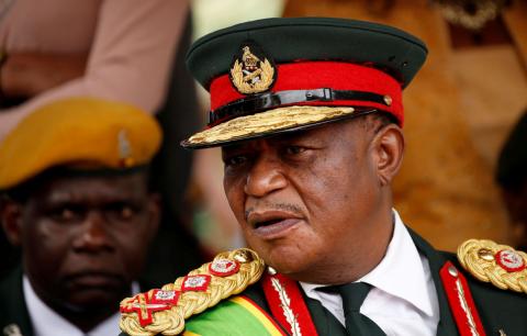 Commander of Zimbabwe Defence Forces General Constantino Chiwenga looks on after the swearing in of Emmerson Mnangagwa as Zimbabwe's new president in Harare, Zimbabwe, November 24, 2017. PHOTO BY REUTERS/Siphiwe Sibeko