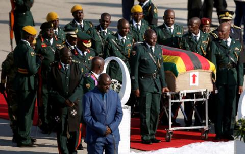 The body of former Zimbabwean President Robert Mugabe arrives back in the country after he died on Friday (September 6) in Singapore after a long illness, Harare, Zimbabwe, September 11, 2019. PHOTO BY REUTERS/Siphiwe Sibeko