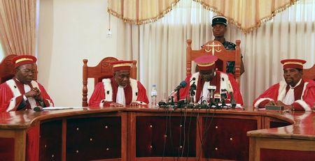 Togo's constitutional court announces Faure Gnassingbe won a third term as president with 58.77 percent of the vote in an election held on April 25, defeating opposition leader Jean-Pierre Fabre, in Lome, May 3, 2015. PHOTO BY REUTERS/Noel Kokou Tadegnon