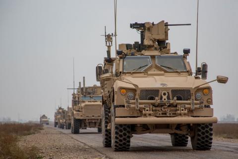 A Coalition convoy of U.S. led international coalition against the Islamic State of Iraq and the Levant (ISIL) stops to test fire their M2 machine guns and MK19 grenade launcher in the Middle Euphrates River Valley in the Deir ez-Zor province, Syria, November 22, 2018. PHOTO BY REUTERS/Courtesy Matthew Crane/U.S. Army