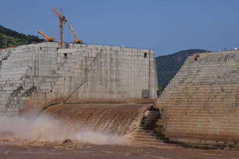 Water flows through Ethiopia's Grand Renaissance Dam as it undergoes construction work on the river Nile in Guba Woreda, Benishangul Gumuz Region, Ethiopia. PHOTO BY REUTERS/Tiksa Negeri