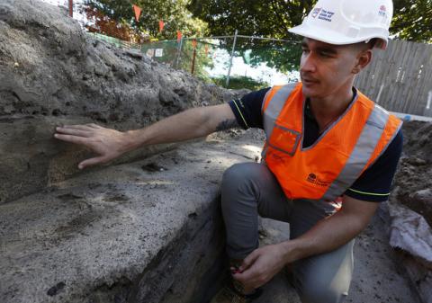 Cultural heritage manager Danny Franks inspects the excavation site where he had discovered Aboriginal artifacts in the ground at a construction site for a light railway in Sydney, March 31, 2016. PHOTO BY REUTERS/Jason Reed