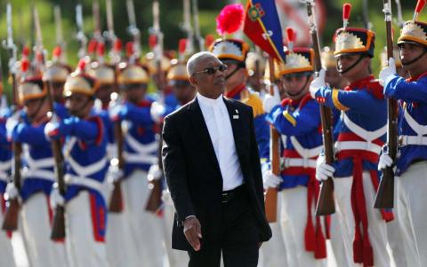 Guyana's President David Arthur Granger review an honour guard during Mercosur trade bloc annual summit in Brasilia, Brazil, December, 21, 2017. PHOTO BY REUTERS/Adriano Machado