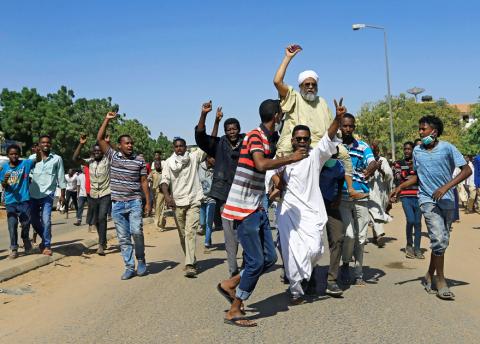 Sudanese demonstrators chant slogans near the home of a demonstrator who died of a gunshot wound sustained during anti-government protests in Khartoum, Sudan, January 18, 2019. PHOTO BY REUTERS/Mohamed Nureldin Abdallah
