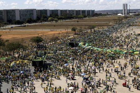 Demonstrators attend a protest against Brazil's President Dilma Rousseff, part of nationwide protests calling for her impeachment, at Paulista Avenue in Brasilia, Brazil, August 16, 2015. PHOTO BY REUTERS/Ueslei Marcelino
