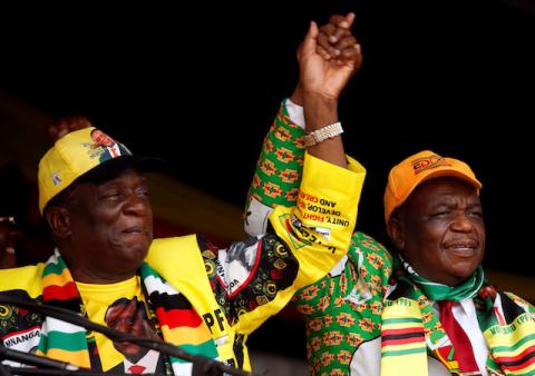 President Emmerson Mnangagwa and his deputy Constantino Chiwenga greet supporters of his ZANU PF party at a rally in Murombedzi, Zimbabwe, November 24, 2018. PHOTO BY REUTERS/Philimon Bulawayo